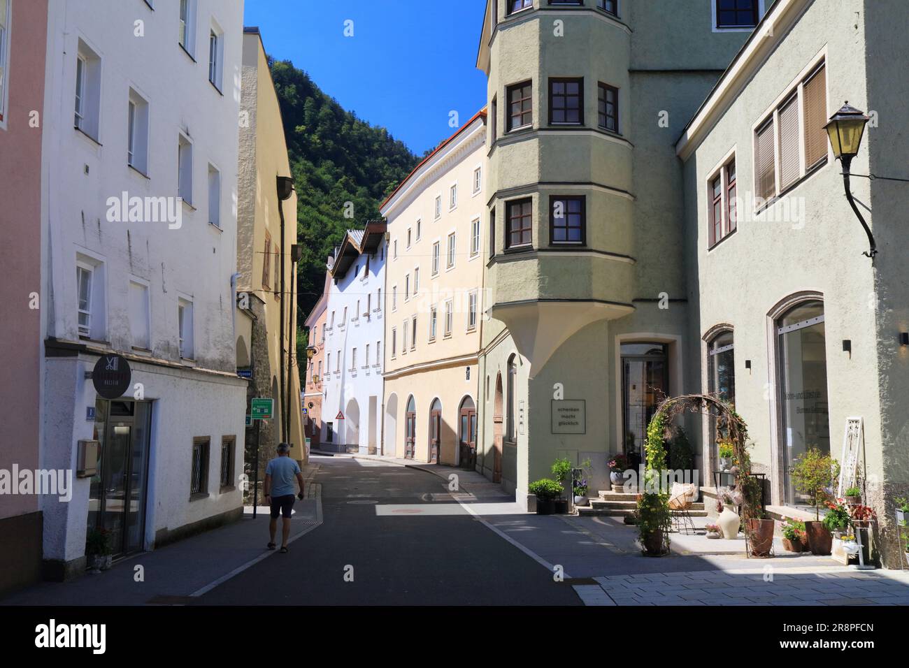 HALLEIN, AUSTRIA - AUGUST 4, 2022: People visit Old Town of Hallein in Salzburg State, Austria. Stock Photo