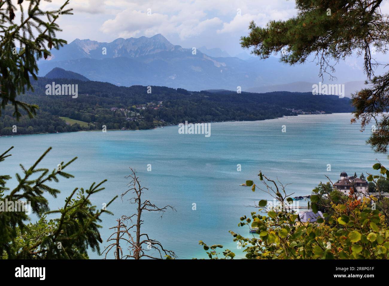 Worthersee mountain lake in Austrian Alps. Austria landscape in State of Carinthia. Town of Portschach am Worther See (Poertschach). Stock Photo