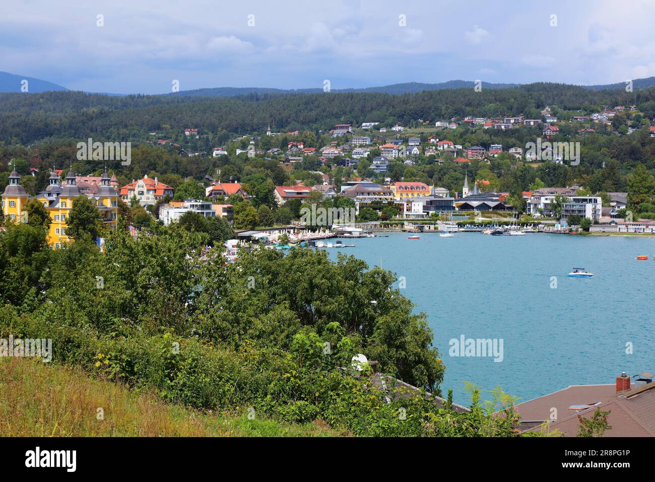 Worthersee mountain lake in Austrian Alps. Austria landscape in State of Carinthia. Town of Velden am Worther See. Stock Photo