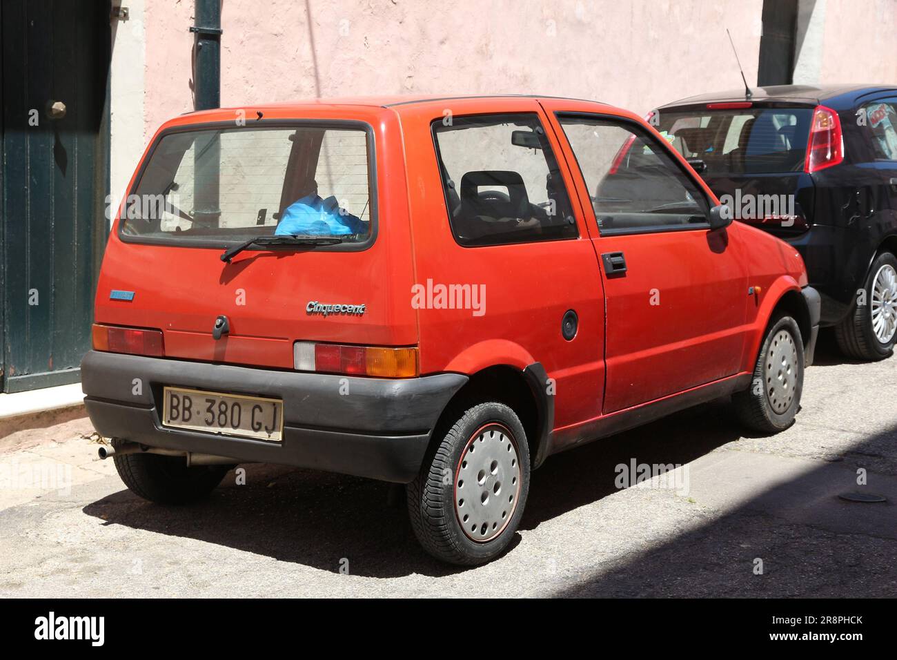 NARDO, ITALY - MAY 30, 2017: Fiat Cinquecento mini city car parked in a street in Nardo, Italy. There are 41 million motor vehicles registered in Ital Stock Photo