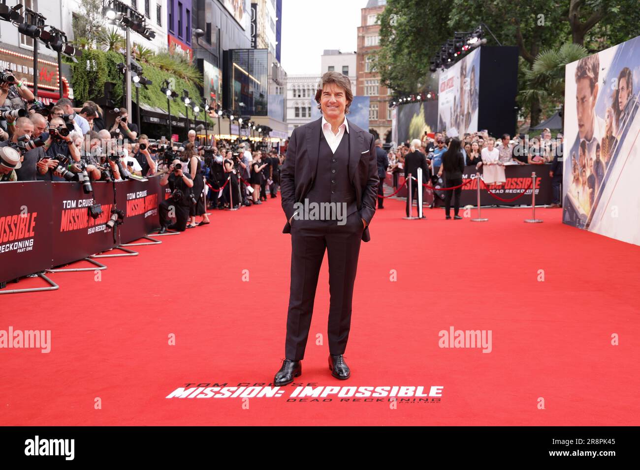 Tom Cruise poses for photographers upon arrival at the premiere of the ...