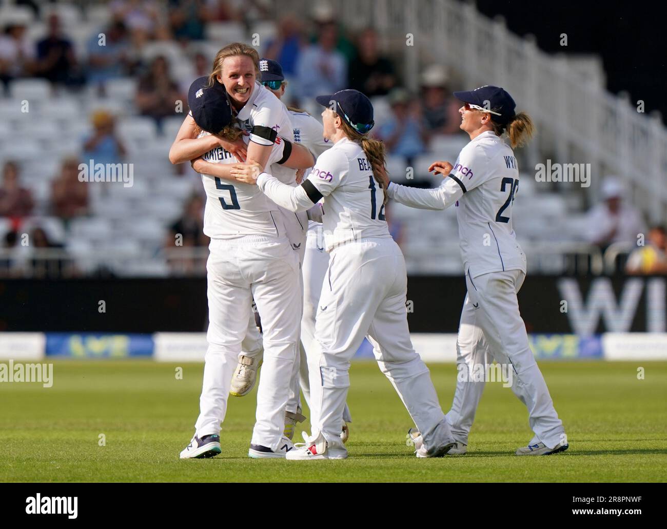 England's Lauren Filer (second left) celebrates taking the wicket of