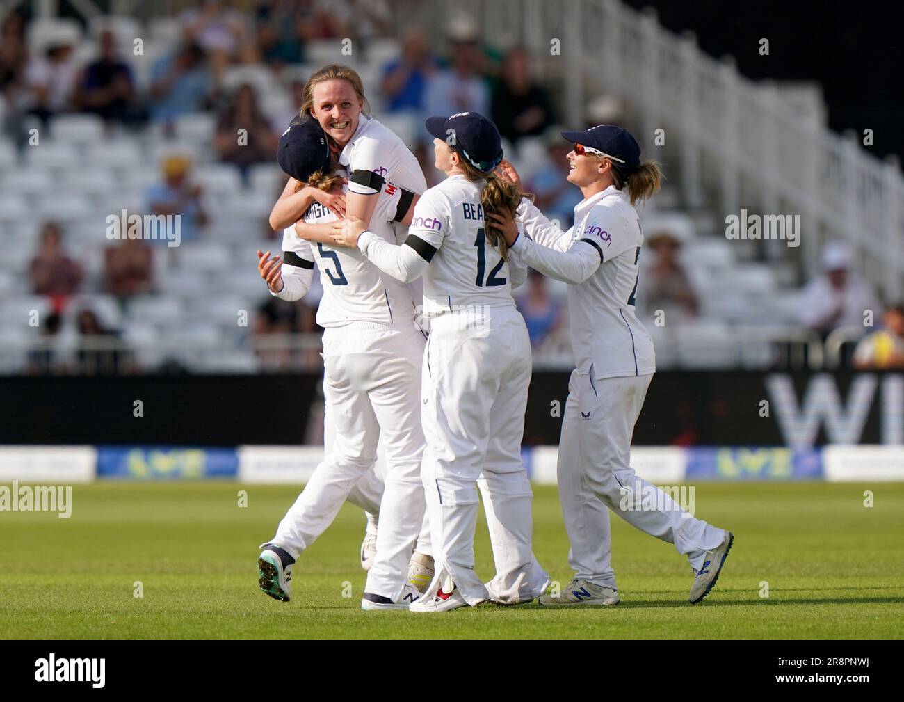 England's Lauren Filer (second left) celebrates taking the wicket of