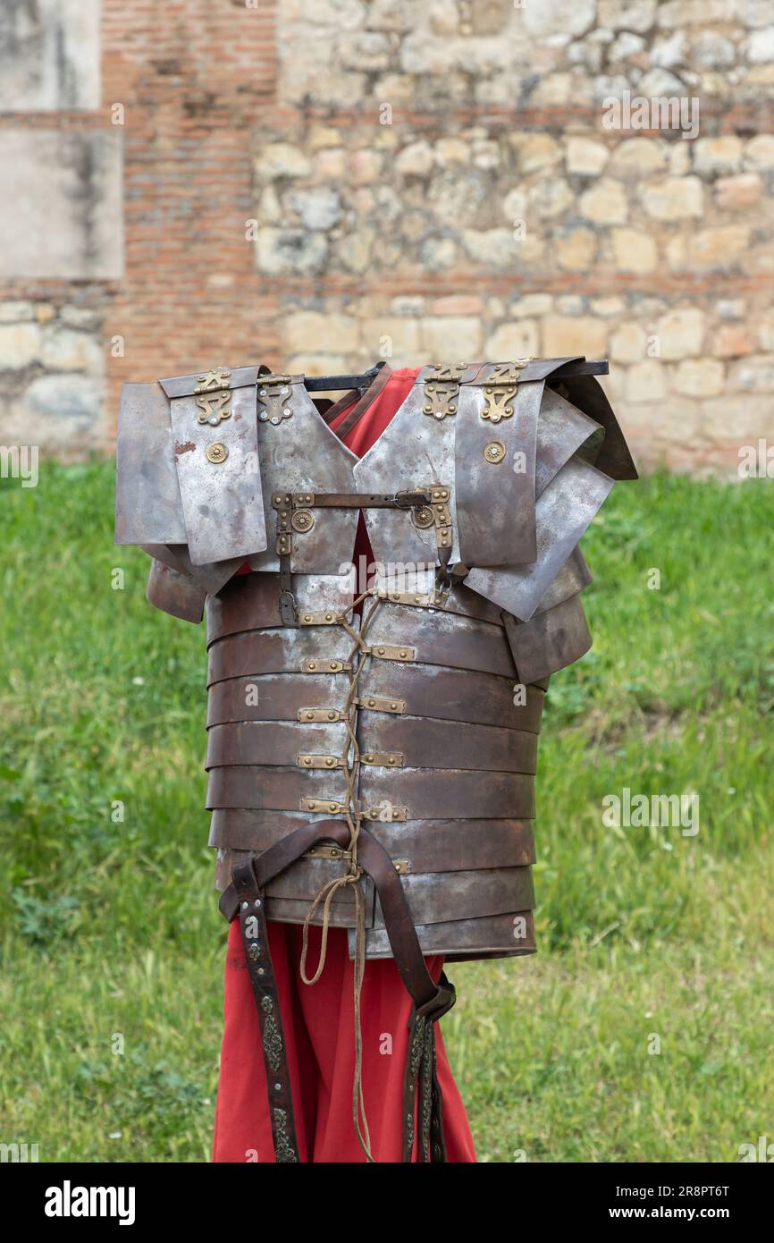 outdoor scene in vertical view of armor, tunic and belt of soldier from ancient roman empire, lorica segmentata, tunic and cingulum militare Stock Photo