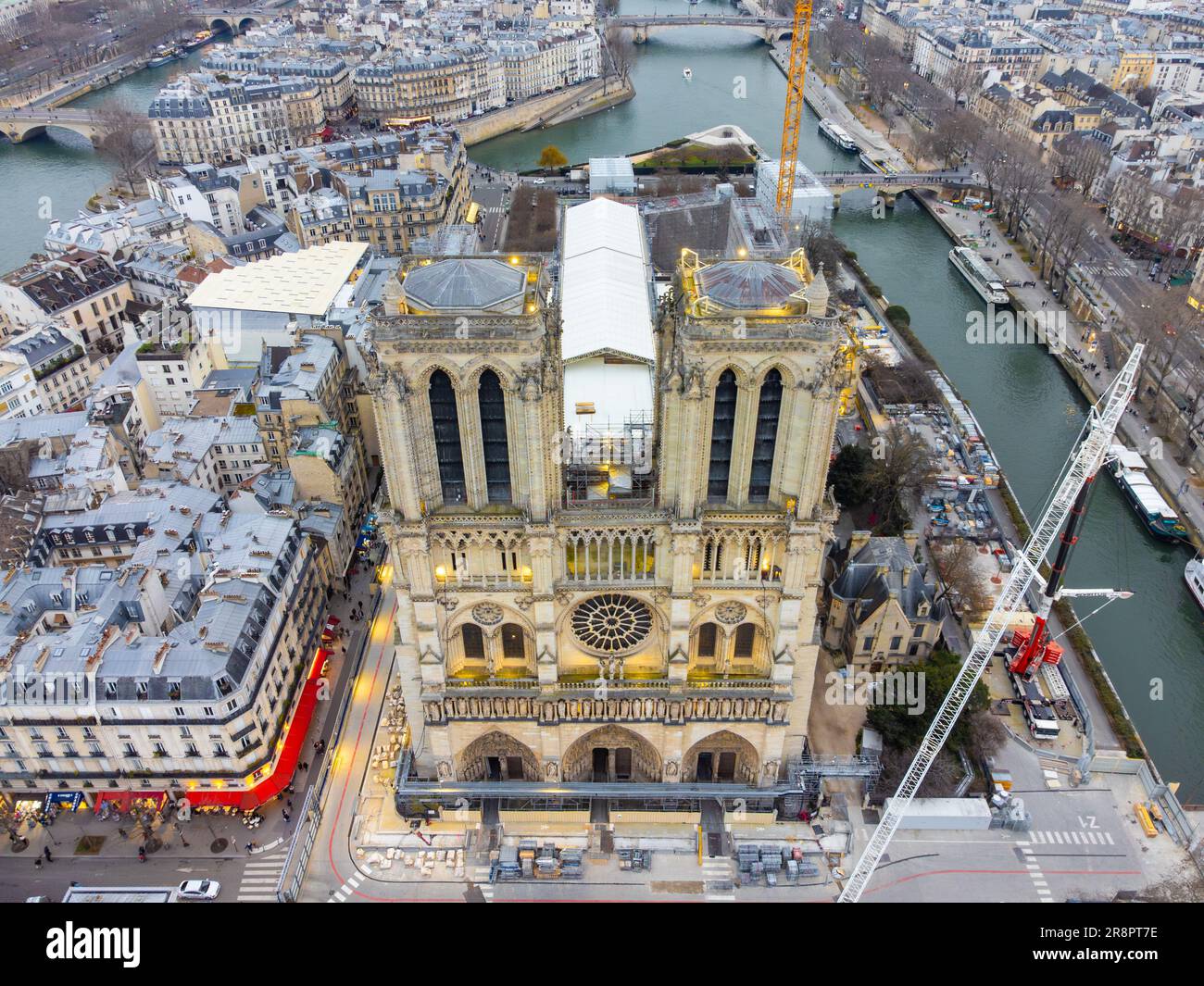 Aerial drone view of Notre-Dame Cathedral during reparation works in Paris, France. The Restoration of the cathedral Notre Dame in Paris is due to the Stock Photo