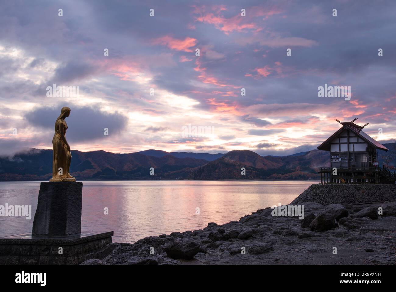 Morning Lake Tazawa and Statue of Princess Tatsuko Stock Photo