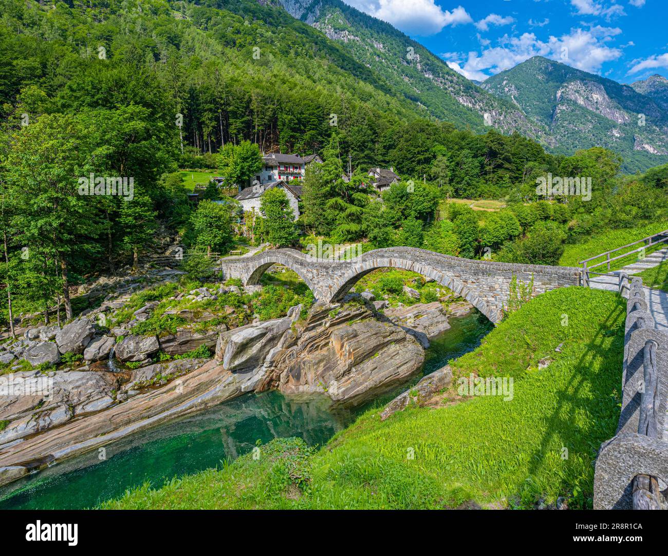 Roman bridge (Ponte dei Salti) crossing the Verzasca River at Lavertezzo in the Verzasca Valley, Canton of Ticino, Switzerland, Europe Stock Photo