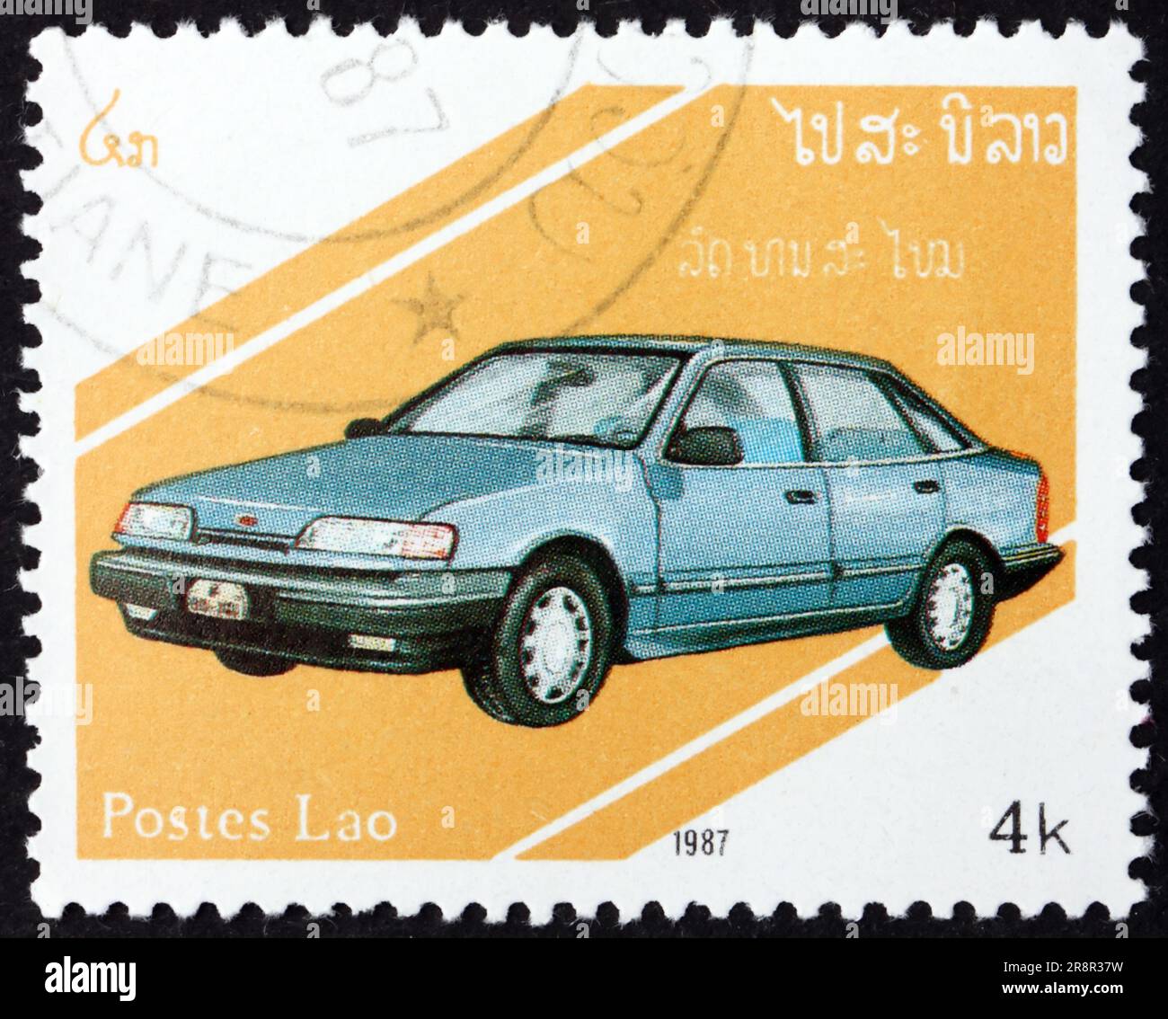 LAOS - CIRCA 1987: a stamp printed in Laos shows Vauxhall Cavalier, Automobile, circa 1987 Stock Photo
