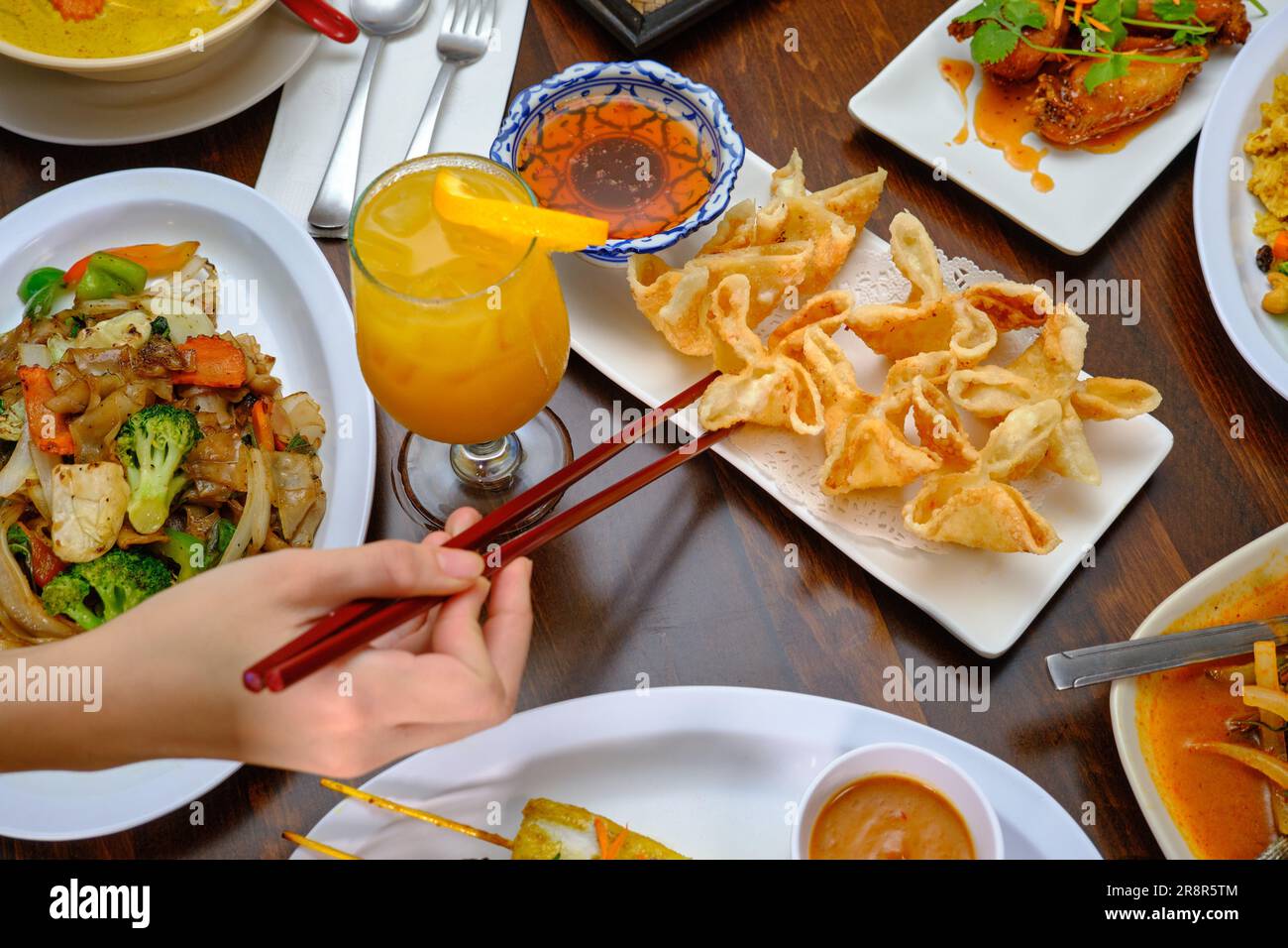 A top view of a dinner table with an array of delicious meals Stock Photo