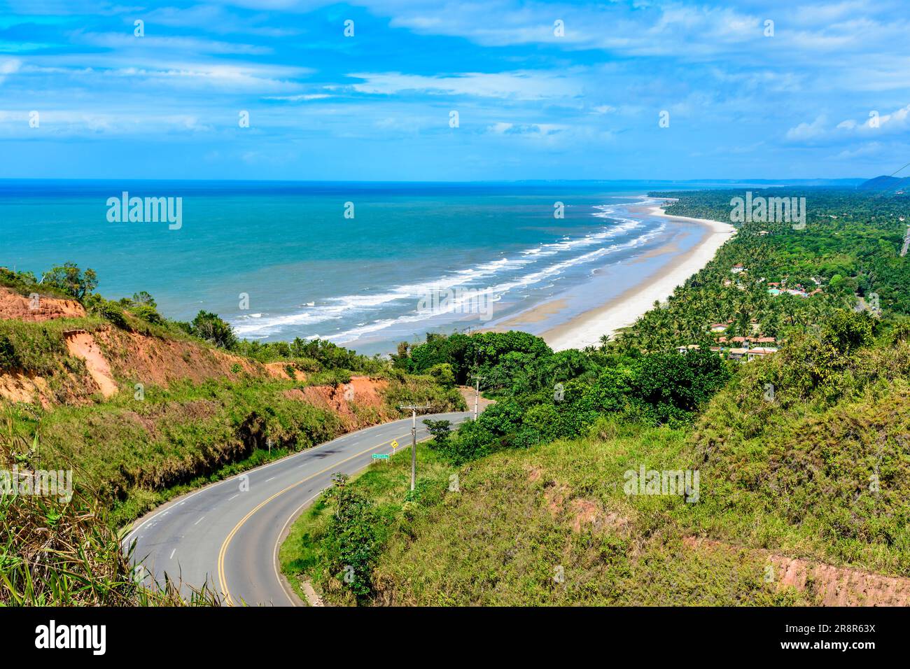 Beautiful road along the coast of the state of Bahia next to the beaches of Pe de Serra and Sargi in Serra Grande Stock Photo
