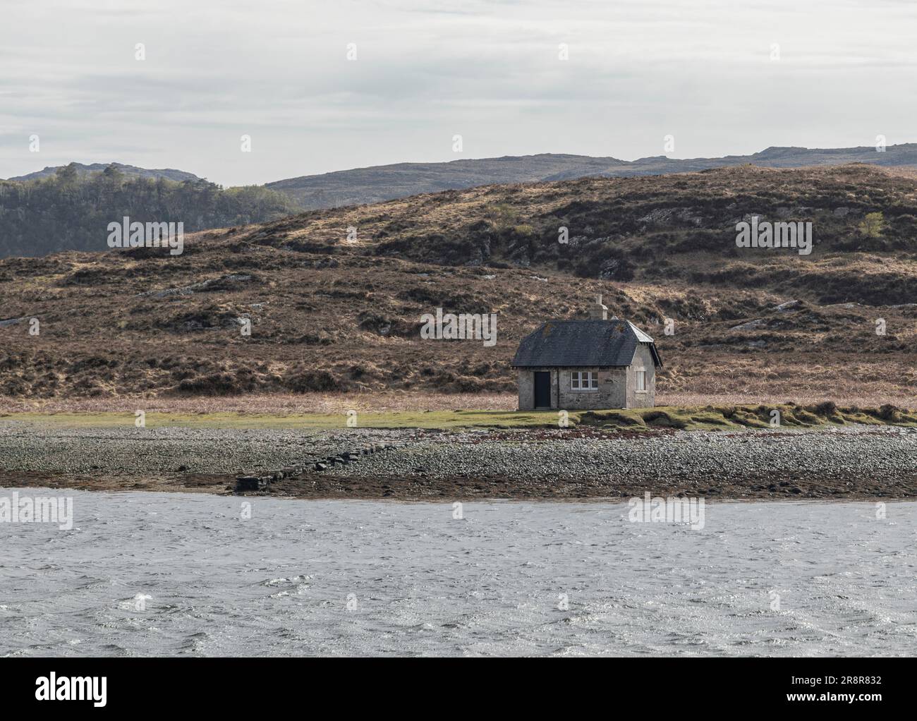 Small remote cottage in the Scottish Highlands on a cool overcaste winter day Stock Photo