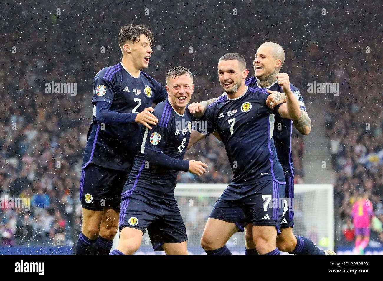 Callum McGregor (8), John McGinn (7), Aaron Hickey (2) and Lyndon Dykes (9) celebrating Callum Mcgregor scoring a goal for Scotland during the Europea Stock Photo