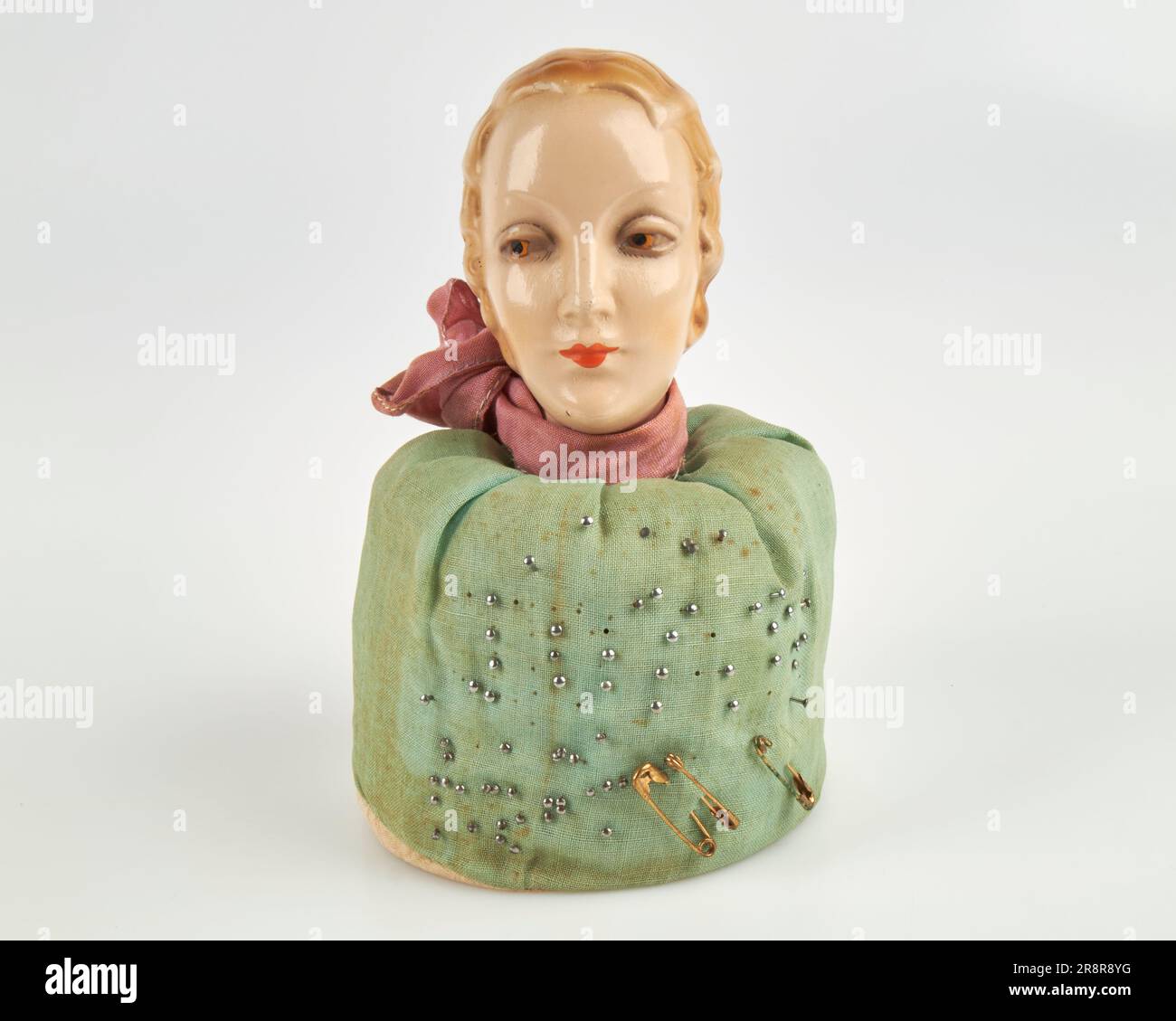 Antique 192030s Art Deco woman head pottery pin cushion Stock Photo