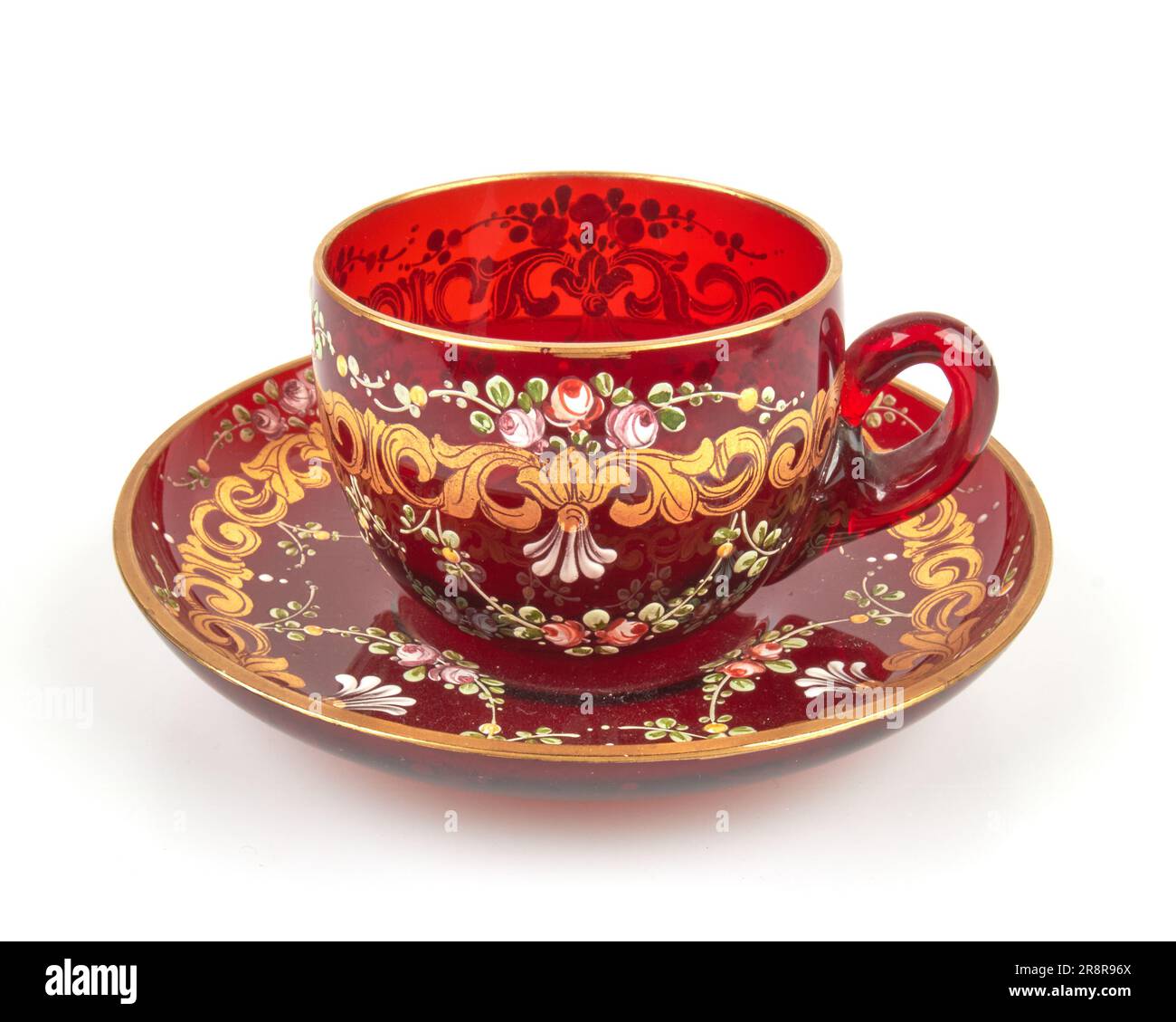 Antique 1920 30s Venetian Murano enamelled and gilded red glass cup and saucer Stock Photo