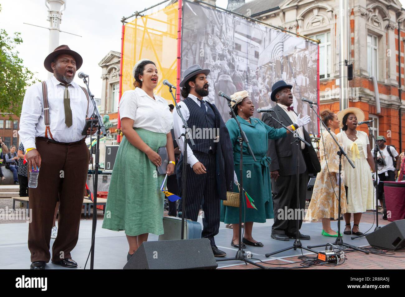 London, UK. 23rd June, 2023. Members of the Brixton-based Pegasus Opera perform in Windrush Square as part of events to mark the 75th anniversary of the Empire Windrush docking at Tilbury. Credit: Anna Watson/Alamy Live News Stock Photo