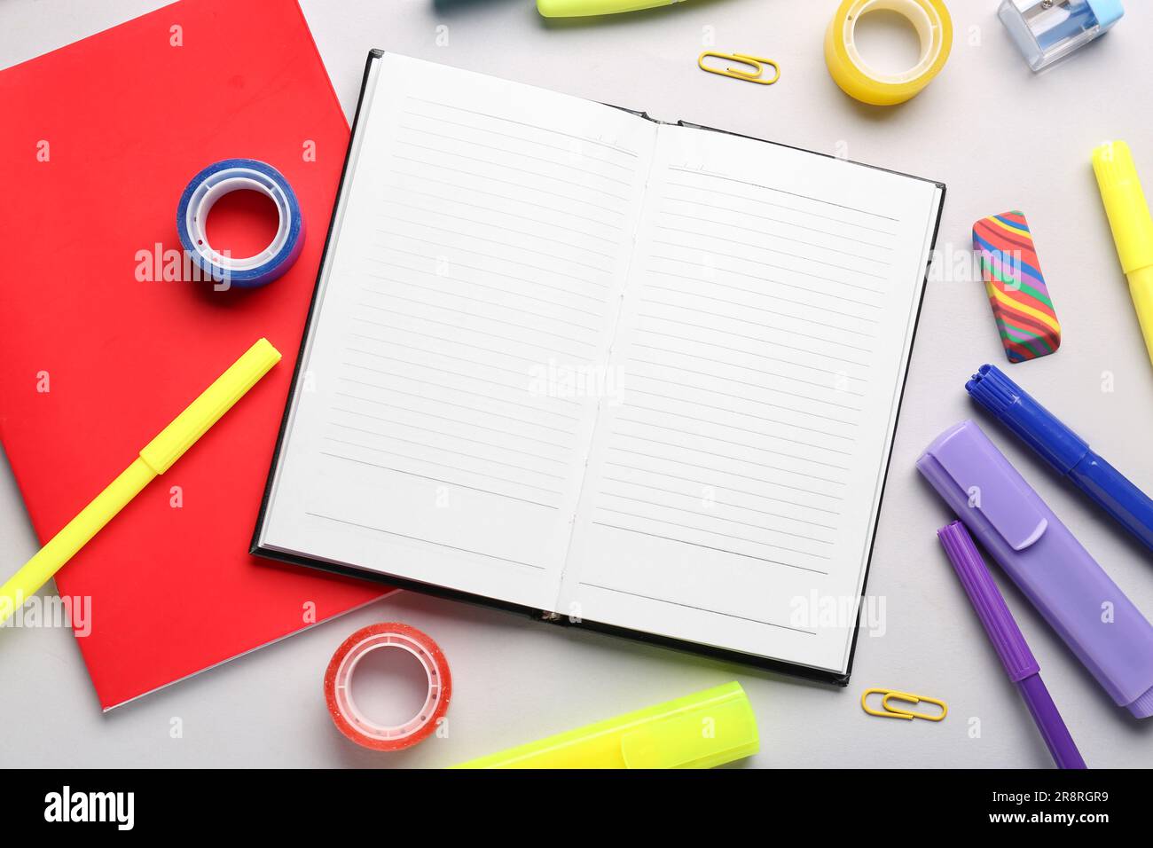 Notebooks with different school stationery on white background Stock ...