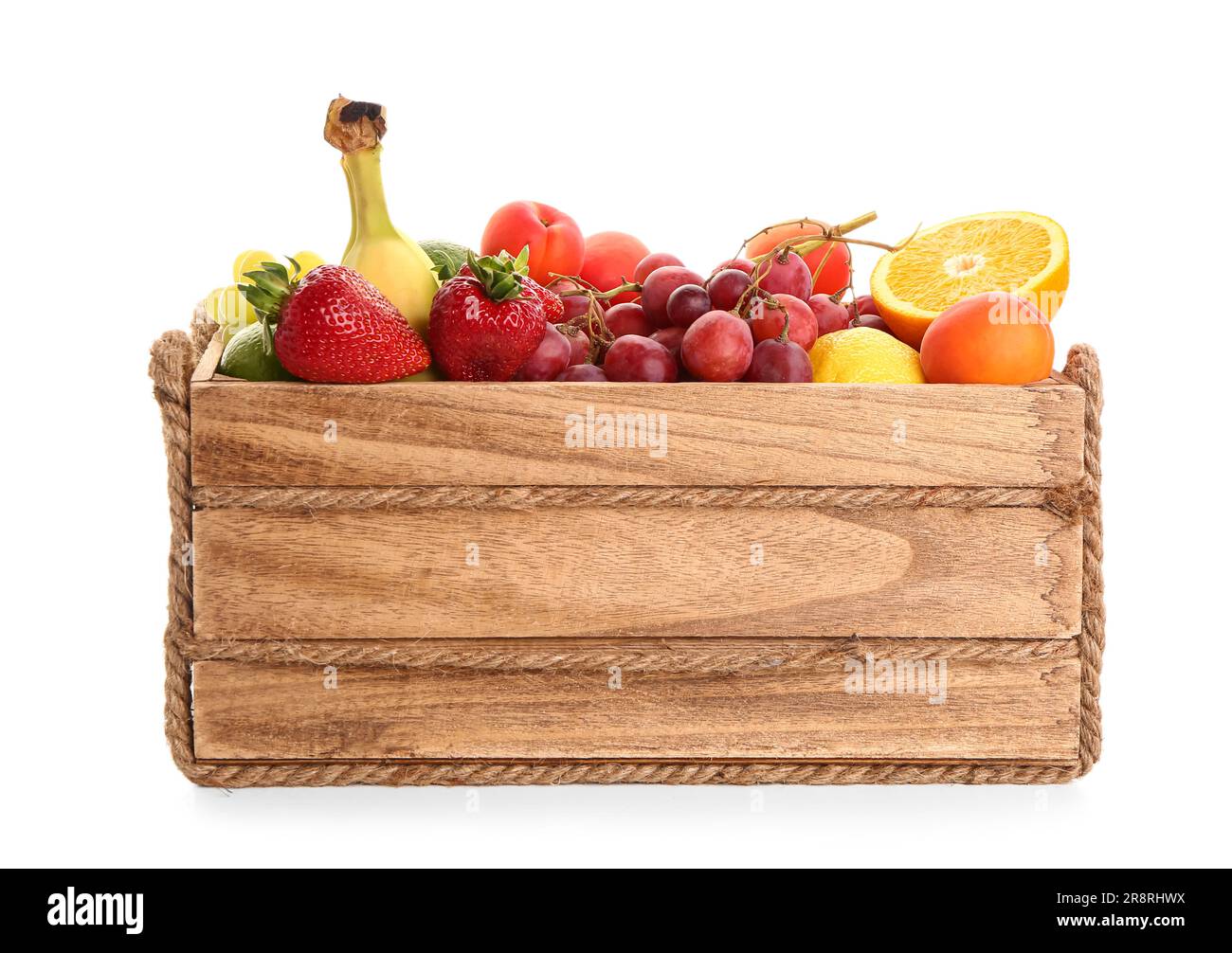 Wooden box with different fresh fruits on white background Stock Photo ...