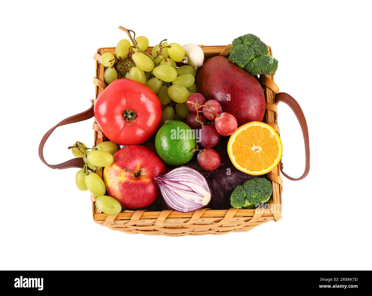 Wicker basket with different fresh fruits and vegetables on white ...
