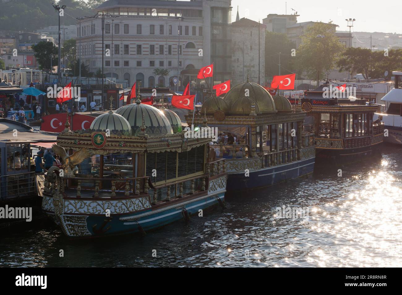Balik Ekmek (fish sandwich) boats at Eminonu beside the Golden Horn river in Istanbul, Turkey Stock Photo