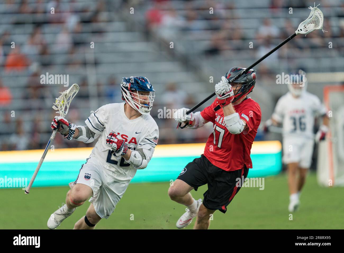 San Diego, USA. 21st June, 2023. Tom Schreiber (26) controls the ball for USA at the World Lacrosse Men's Championship opening game USA vs Canada at Snapdragon Stadium. Credit: Ben Nichols/Alamy Live News Stock Photo