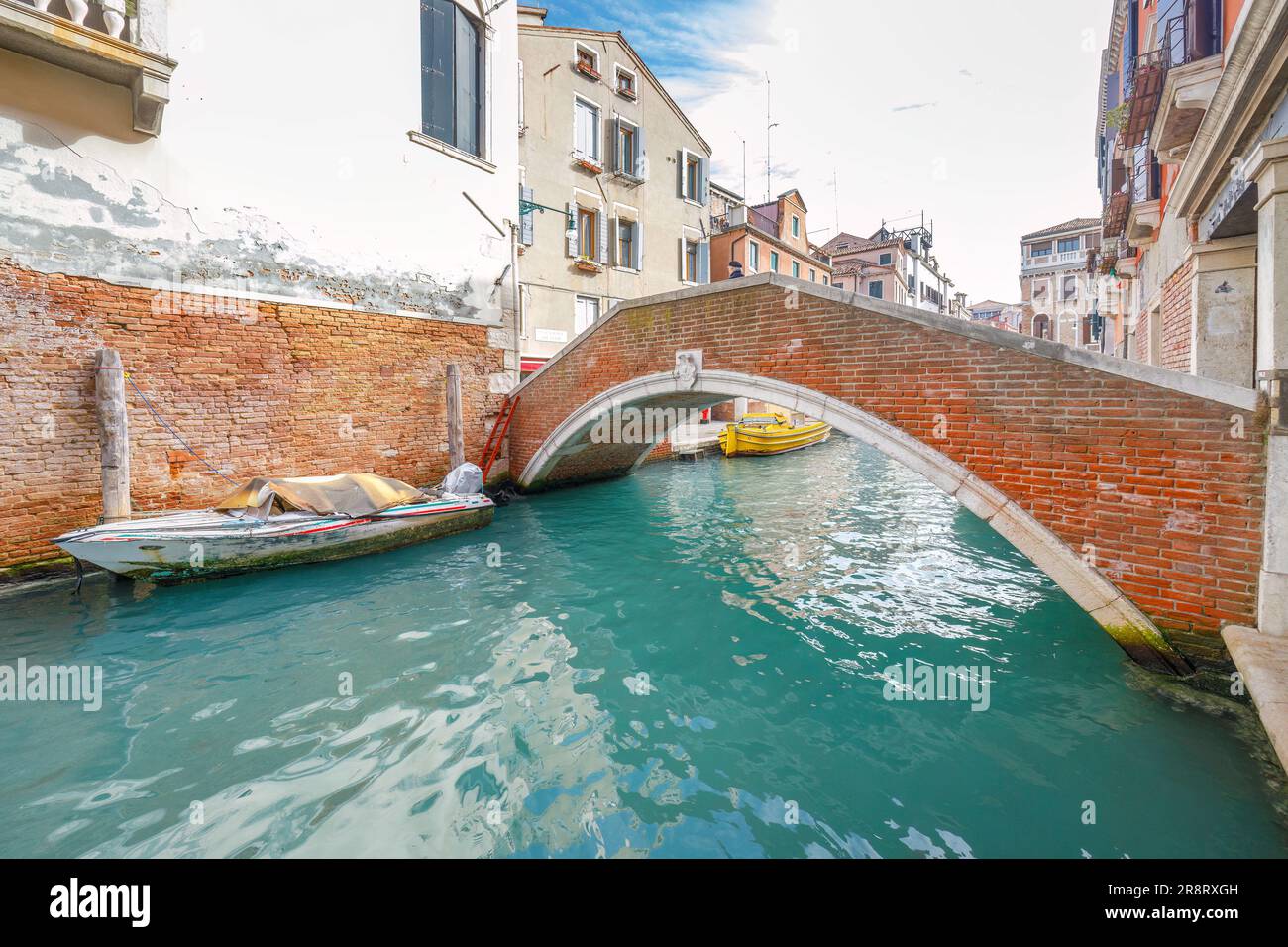 Stone bridge over the canal in Venice, Italy, Europe. Stock Photo