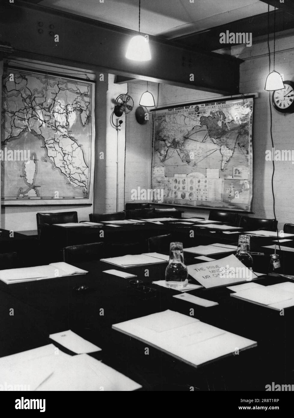 Secret War Headquarters To Be Preserved as Museum-- 'The cabinet Room' - The desk of Mr. Churchill with a card bearing his name, can be seen, in this picture of the Cabinet Room at the secret War Head *****. The secret underground War Headquarters of the War Cabinet and the Chiefs of Staff, in Marshall, Street, Westminster, are to be preserved for their historic interest. The war map room, the Cabinet room, and the room from which Mr. Churchill made many of his inspired broadcasts are included in the plan of preservation. March 17, 1948. (Photo by Reuterphoto). Stock Photo