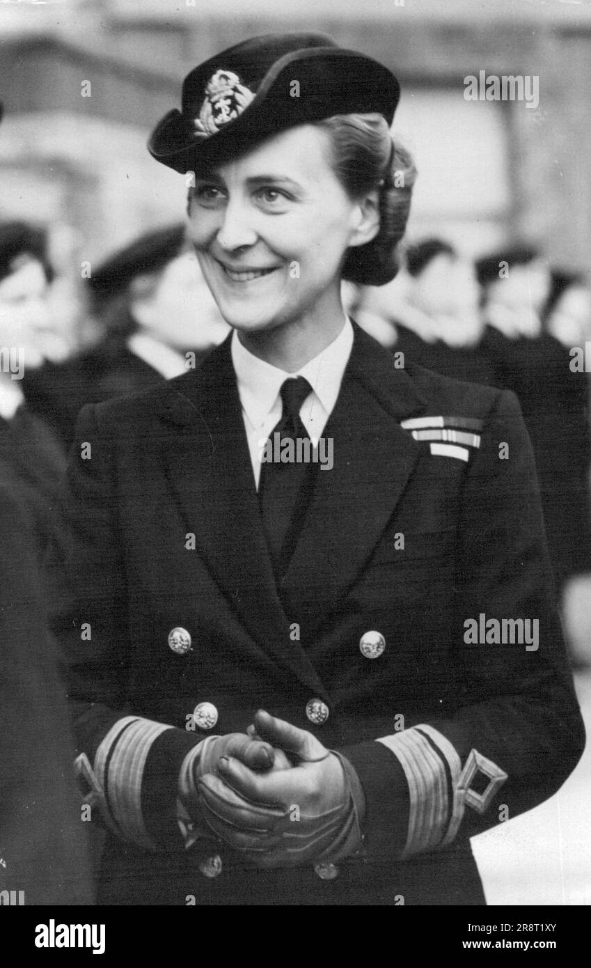 Duchess Of Kent Visits Women's Royal Naval Service Training Centre -- A smiling picture of the Duchess of Kent inspecting the Guard of Honour of W.R.N.S., on arrival at the Training Centre. The Duchess of Kent made her first public appearance since the death of the Duke of Kent, when she visited a W.R.N.S. Training Centre, in the London area. November 04, 1942. (Photo by Planet News Ltd.). Stock Photo