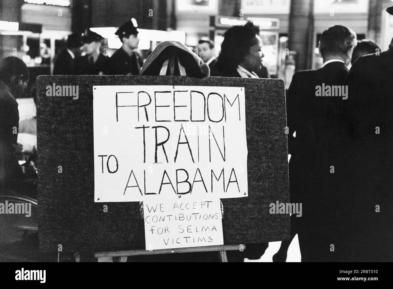 Sign announcing 'Freedom Train to Alabama', also noting that one can make 'contributions' for victims of civil rights march from Selma to Montgomery, Alabama, Peter Pettus, March 1965 Stock Photo