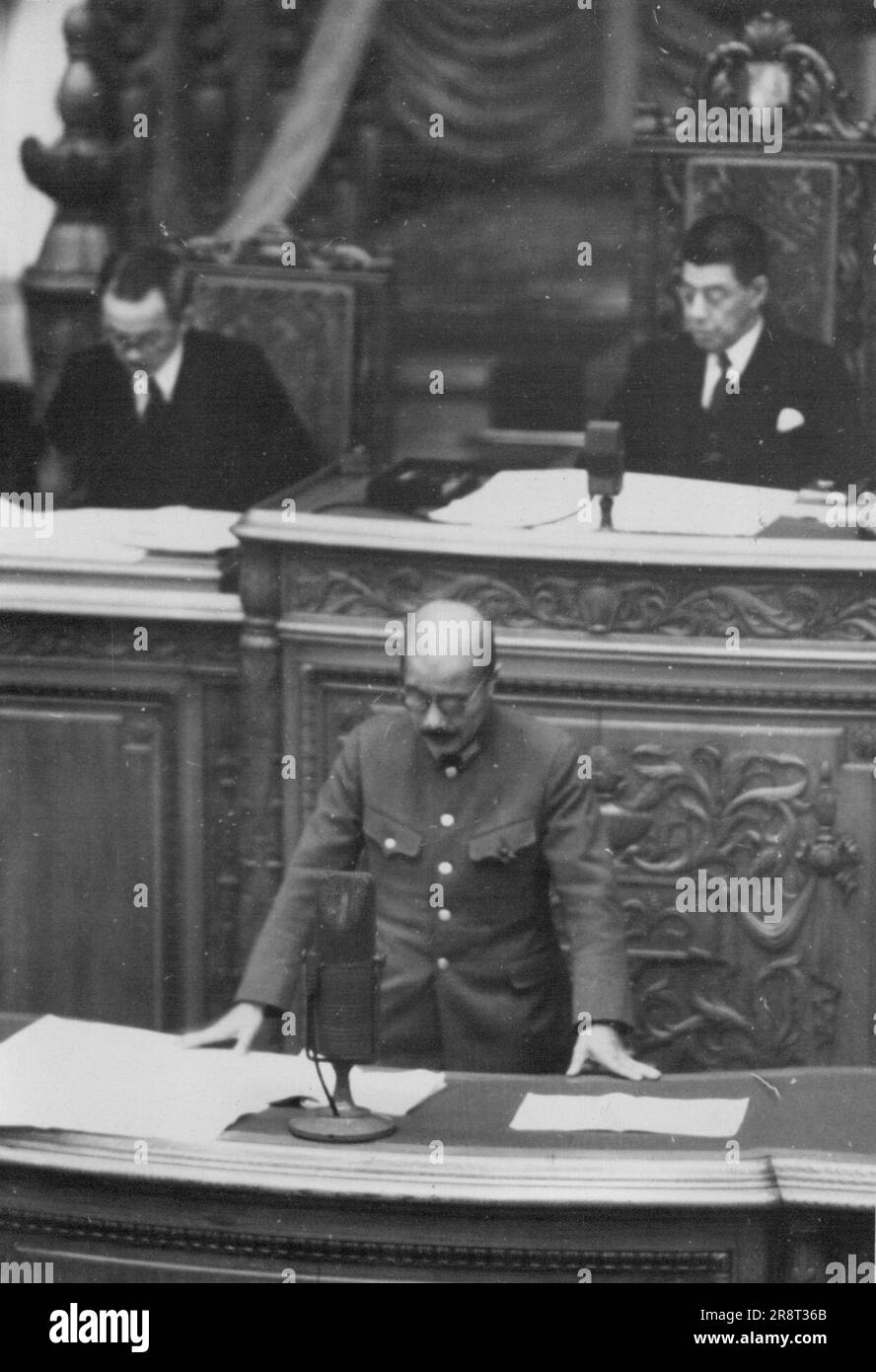 War Minister Tojo ... War Minister Hideki Tojo, was taken this morning at the House of Peers when the 76th session of the Imperial Diet, as the situation in Far East, in which he stated 'The Chungking regime has been weakened tremendously in both fighting power and financial strength dut to consecutive campaigns staged by the Japanese fighting forces'. January 21, 1941. (Photo by The Domei News Photos Service). Stock Photo