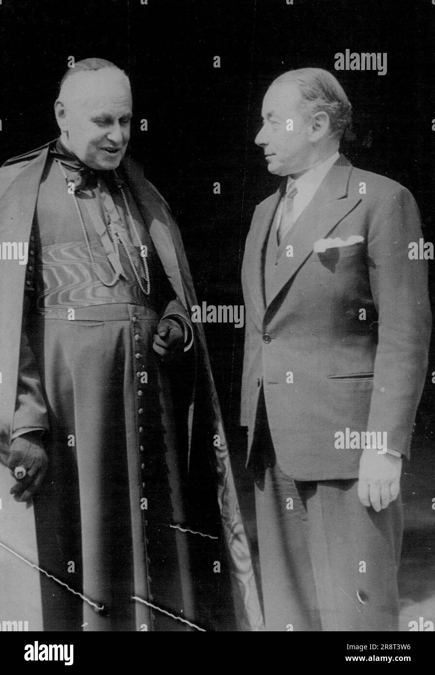 Archbishop of Paris Calls on France's War Premier - Cardinal Suhard, left, the New Archbishop of Paris in Succession to the late Cardinal Verdier, photographed with premier Paul Reynaud on the steps of the foreign office in Paris after he had called on France's popular war premier. May 20, 1940. (Photo by Associated Press Photo). Stock Photo
