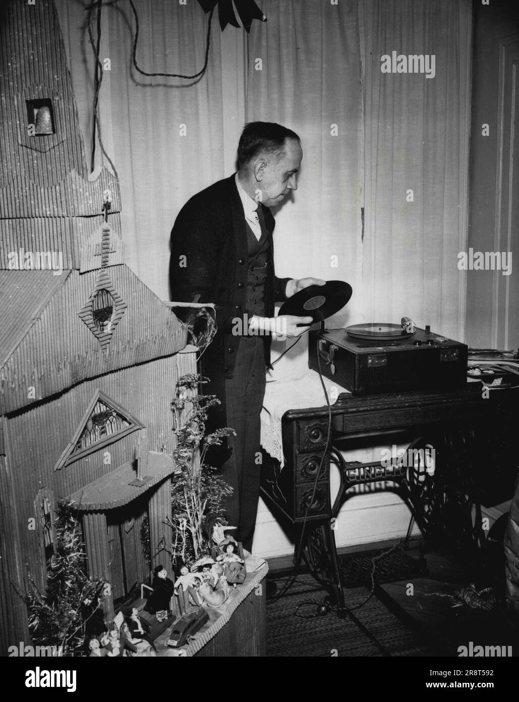 Toy Wedding Charles Fernandez of Floral Park puts a wedding March disc