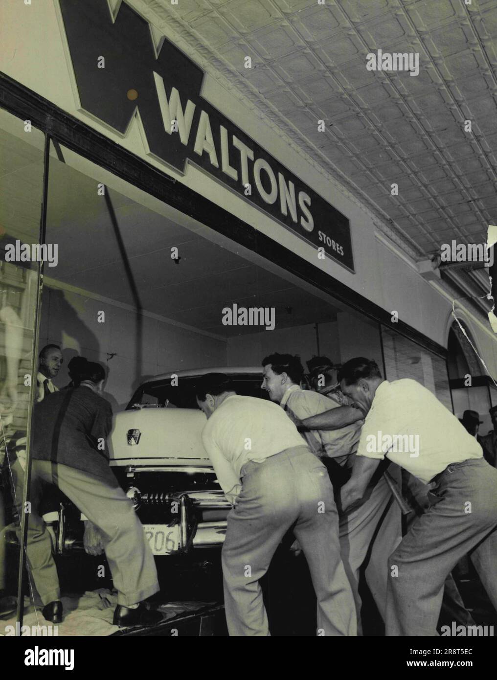 Plate glass was moved early this morning to place a Ford Australian Car