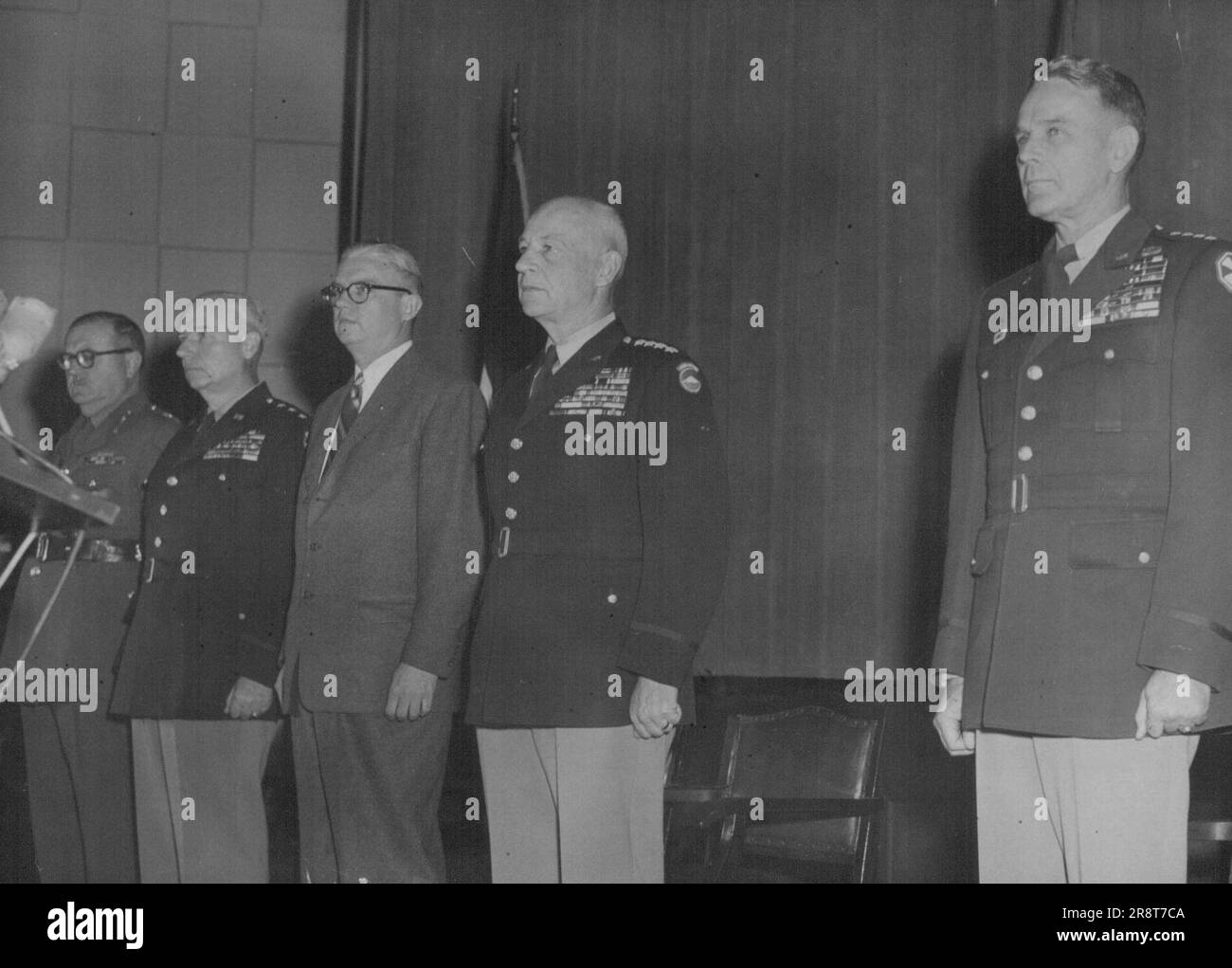 Former UN Supreme Commander Gen. John E. Hull (2nd from right) left Japan on March 31st giving up his command to Gen. Maxwell D. Taylor (right). On left is Commonwealth Commander Lt. Gen Rudolph Bierwirth and in centre US Secretary of the Army Robert Stevens. April 26, 1955. Stock Photo