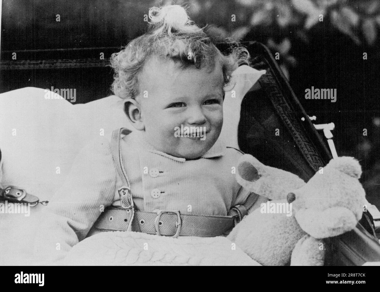 Duke And Duchess Of Kent's Baby Son A New Picture - Prince Edward, the Duke and Duchess of Kent's son, in happy mood in Belgrave Square Gardens, London, Sw., to-day. His is now 14 months old. December 15, 1936. (Photo by Topical Press). Stock Photo