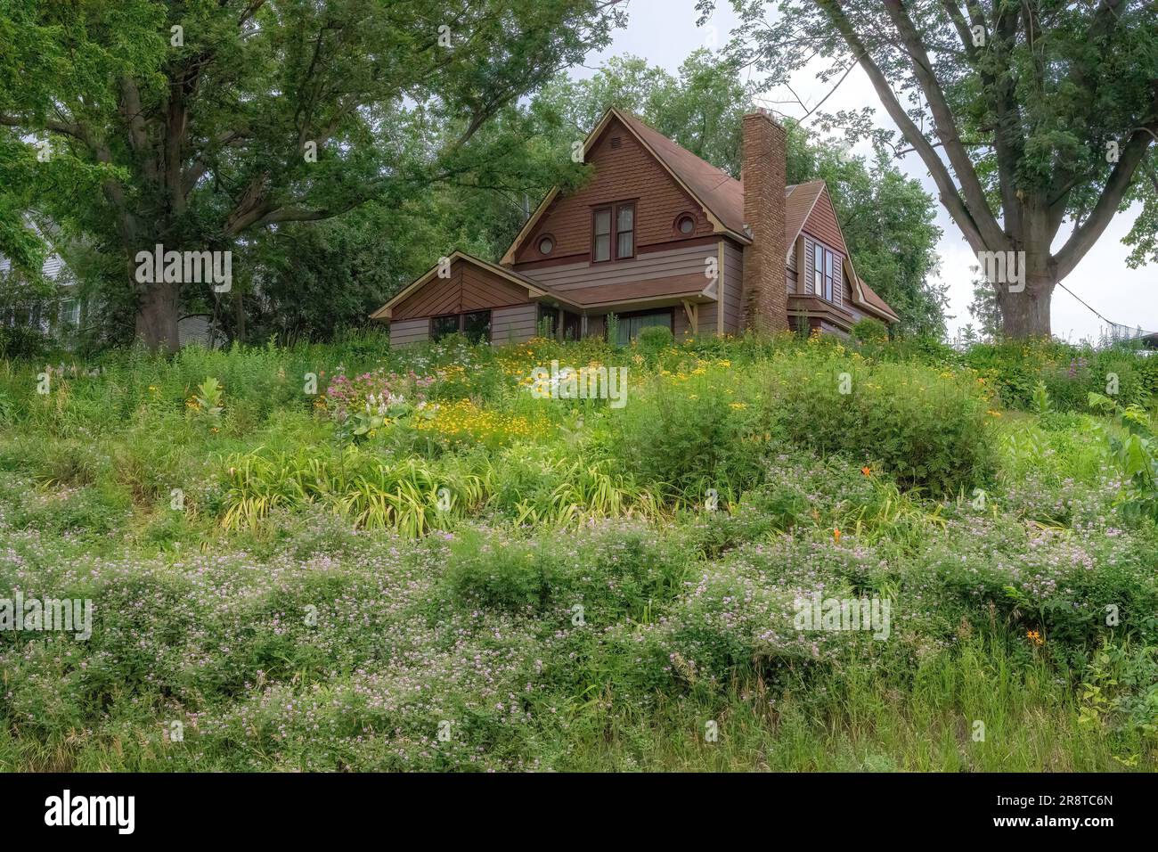 House on a hill on Summit Ave. covered with flowers in Center City