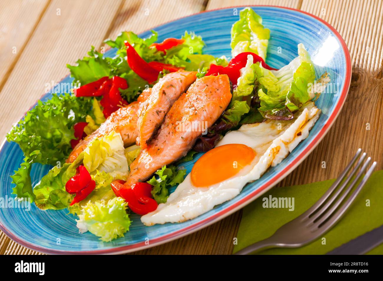 Lowcalorie breakfast with roasted trout Stock Photo Alamy