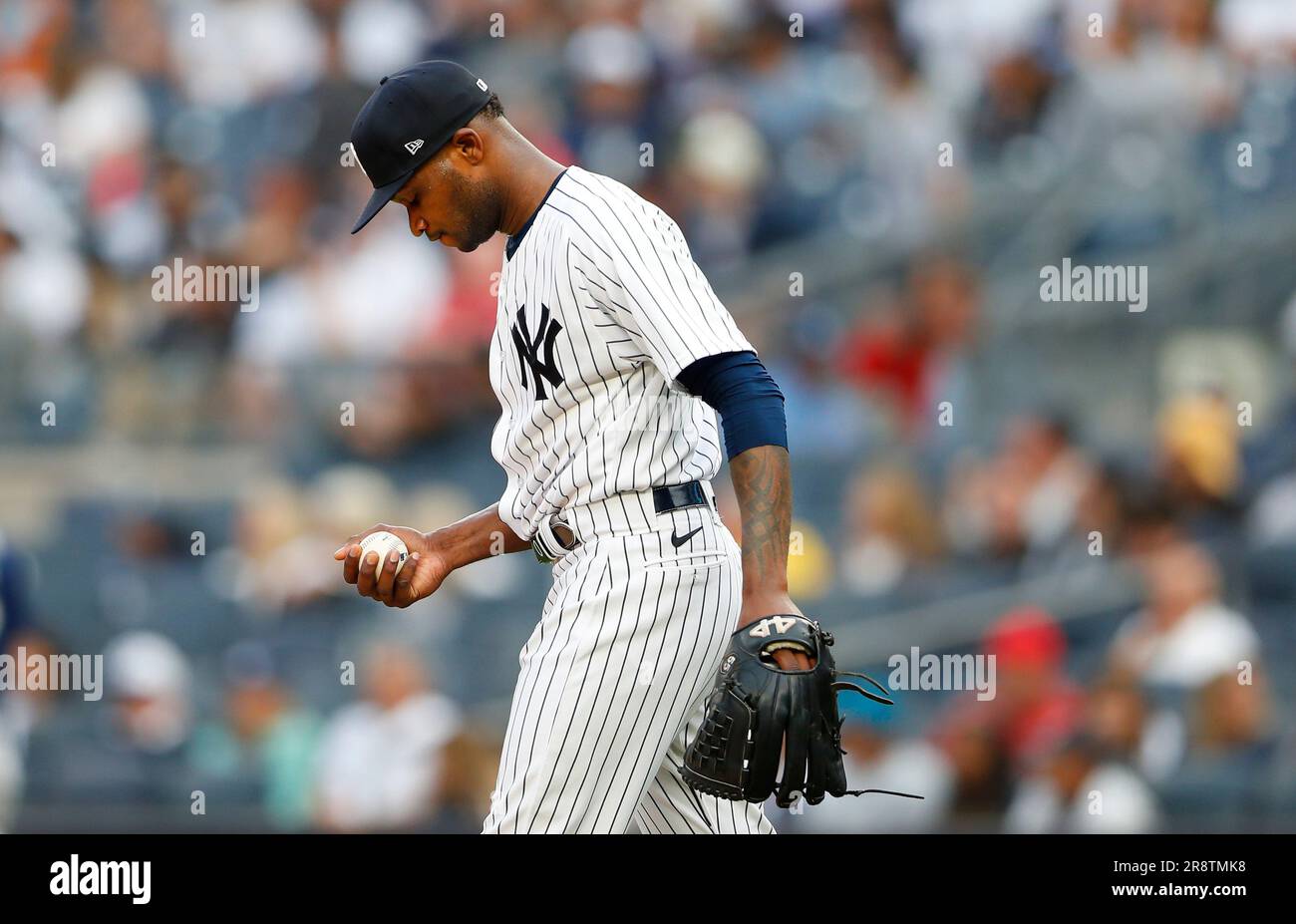 New York Yankees starting pitcher Domingo German reacts after giving up