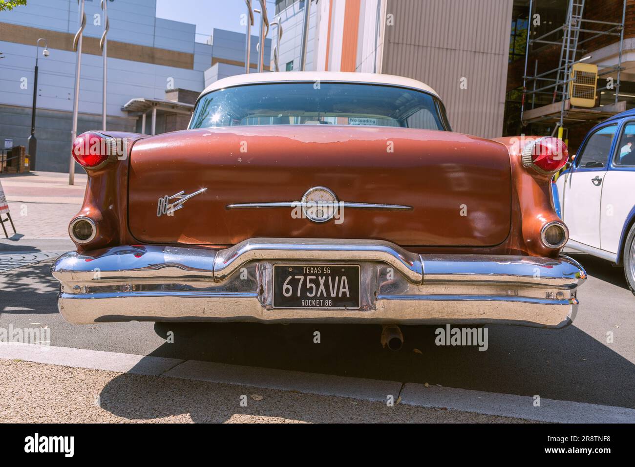 Rear view  of a 1950s Oldsmobile Rocket 88. Boot / trunk emblem and badge. American classic vintage car. Stock Photo