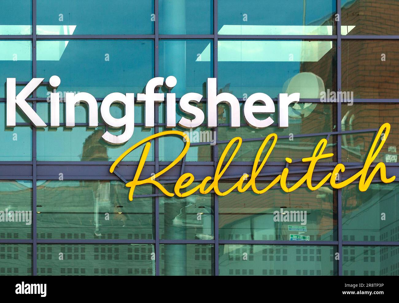 A large sign at the entrance to the Kingfisher Shopping Centre in Redditch, England, home to 150 stores, with a range of large and smaller units. Stock Photo