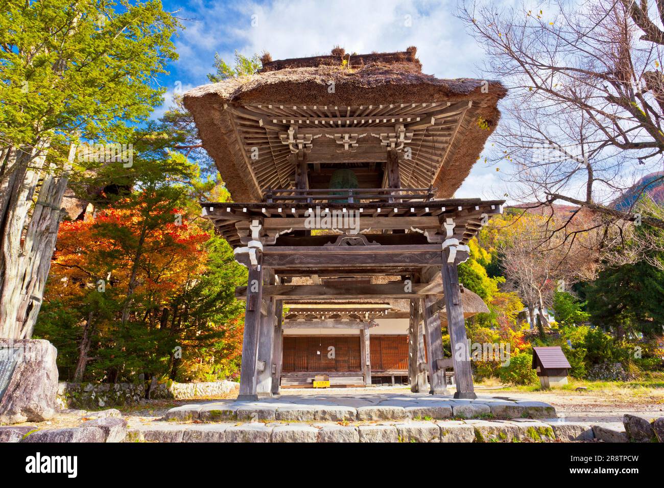 Myozenji Temple bell tower gate at Shirakawago village in autumn Stock Photo