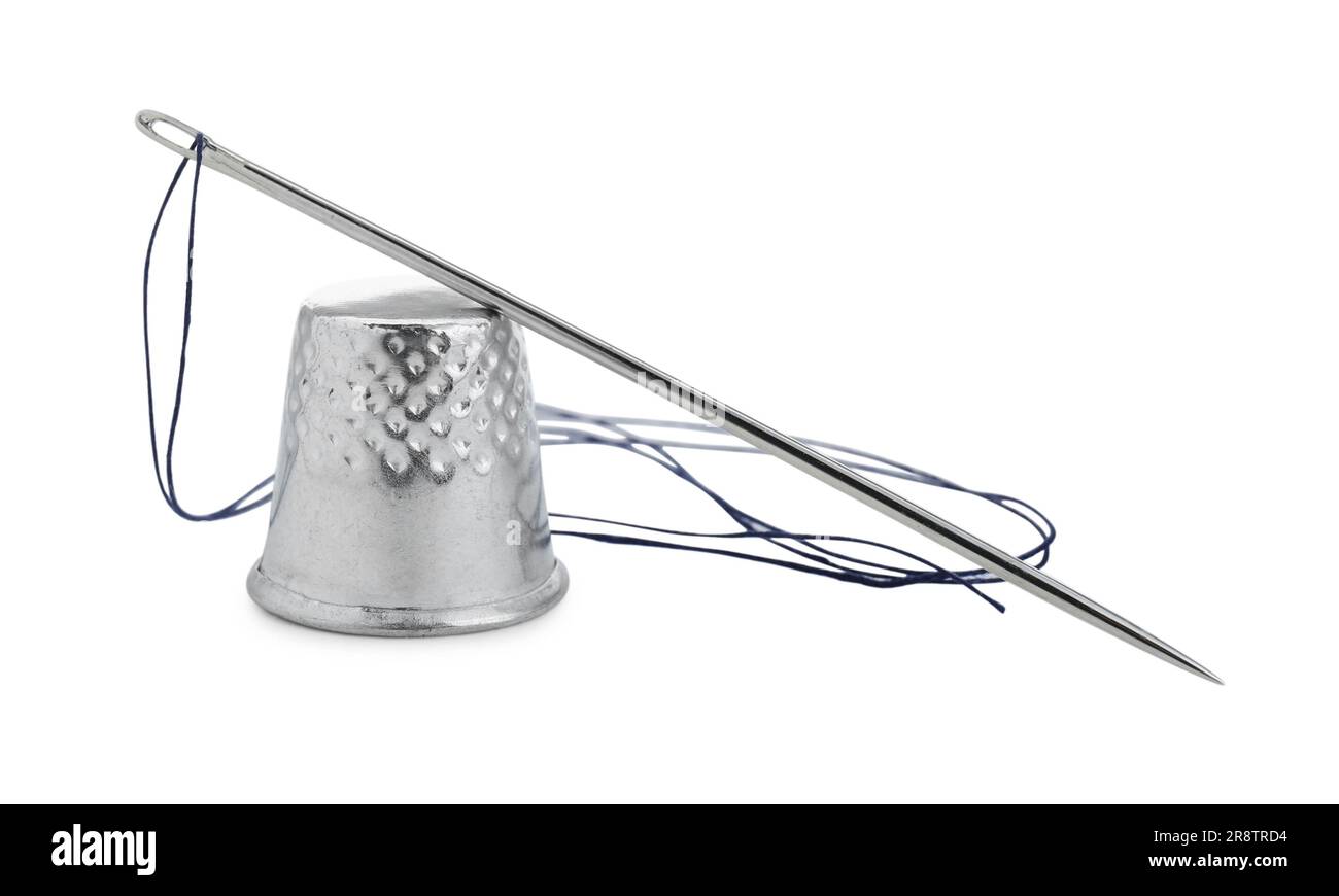 Thimble and needle with sewing thread isolated on white Stock Photo Alamy