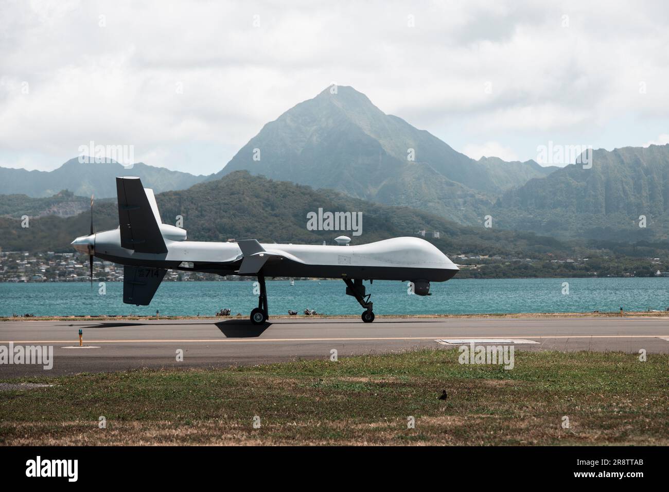U.S. Marine Corps Marine Unmanned Aerial Vehicle Squadron (VMU) 3, Marine Aircraft Group 24, launches an MQ-9A on Marine Corps Air Station Kaneohe Bay, June 21, 2023. VMU-3, safely and successfully test and fly its first MQ-9A remotely piloted aircraft to meet the Naval Air Systems Command safety certification process. The Safe-For-Flight Operations Certification (SFFOC) is the final crucial milestone in VMU-3’s transition from the RQ-21A to the MQ-9A. (U.S. Marine Corps photo by Cpl. Christian Tofteroo). Stock Photo
