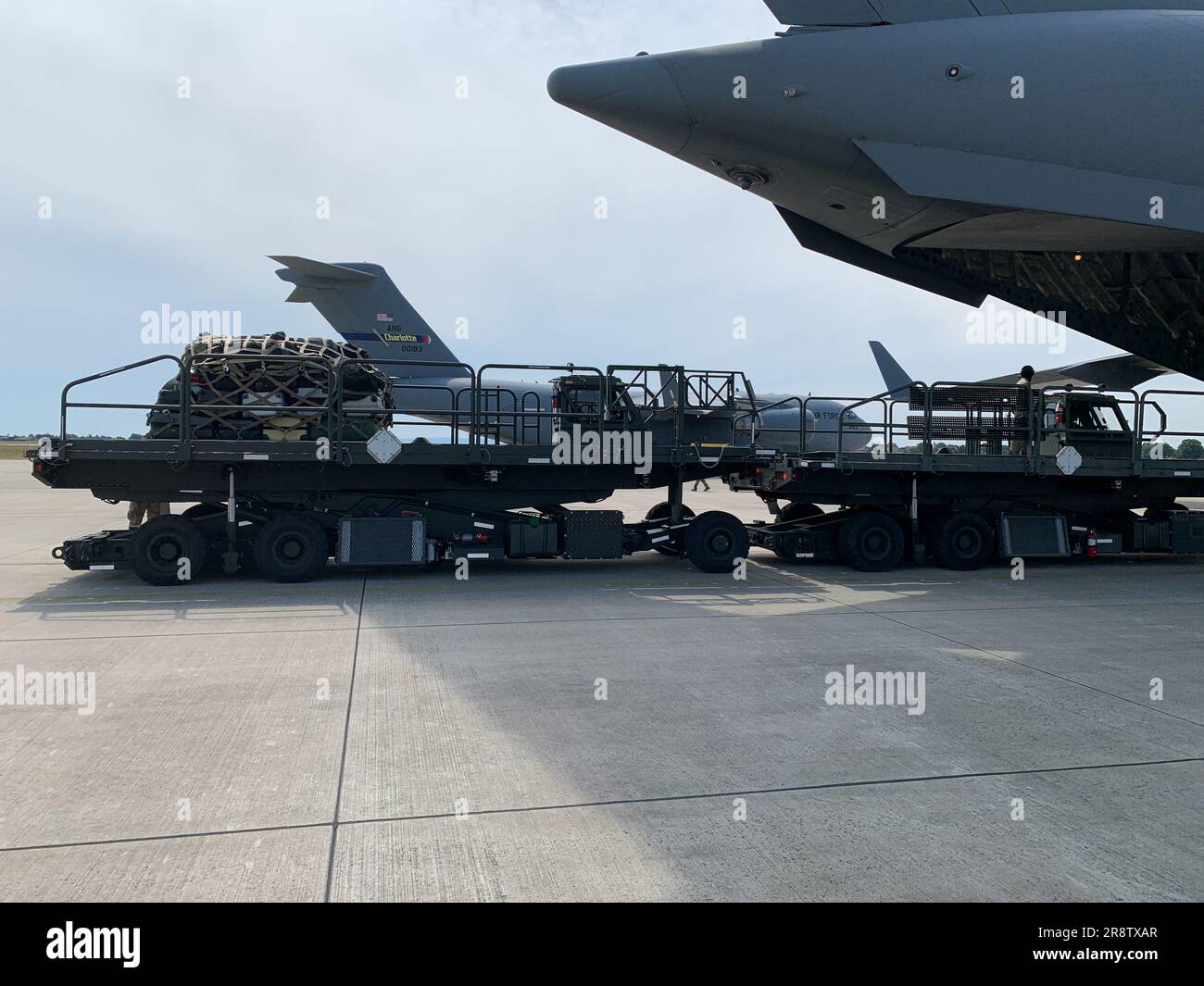 U.S. Airmen with the 123rd Contingency Response Element, 123rd Airlift Wing, Kentucky National Guard, prepare to off-load cargo in preparation for exercise Air Defender 2023 (AD23) at Wunstorf Air Base, Germany, June 1, 2023. Exercise AD23 integrates both U.S and allied air-power to defend shared values, while leveraging and strengthening vital partnerships to deter aggression around the world. (U.S. Air National Guard photo by Senior Master Sgt. Vicky Spesard) Stock Photo