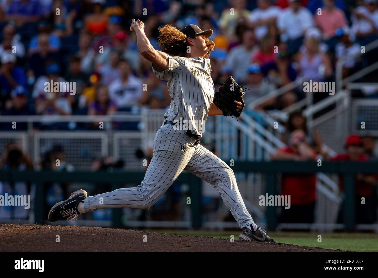 Wake Forest pitcher Rhett Lowder throws to an LSU batter during the