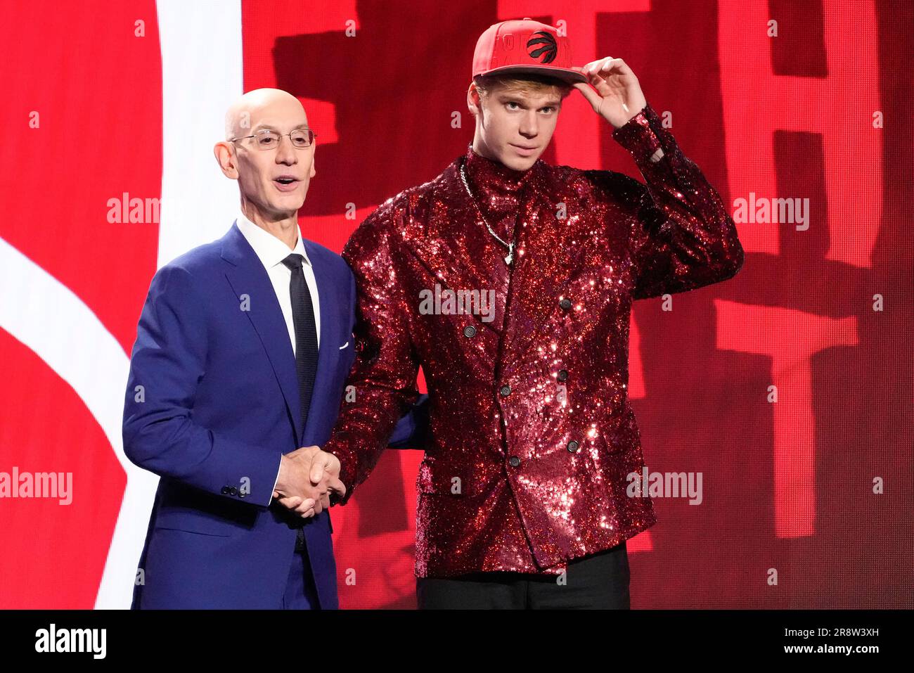 Gradey Dick poses for a photo with NBA Commissioner Adam Silver after being  selected 13th overall by the Toronto Raptors during the NBA basketball  draft, Thursday, June 22, 2023, in New York. (