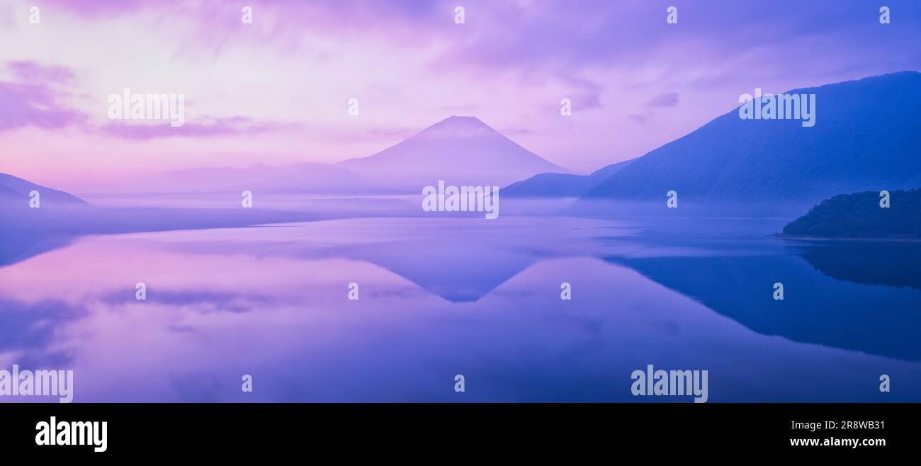 The upside down Fuji reflecting in Lake Motosu and Mt Fuji sunrise Stock Photo