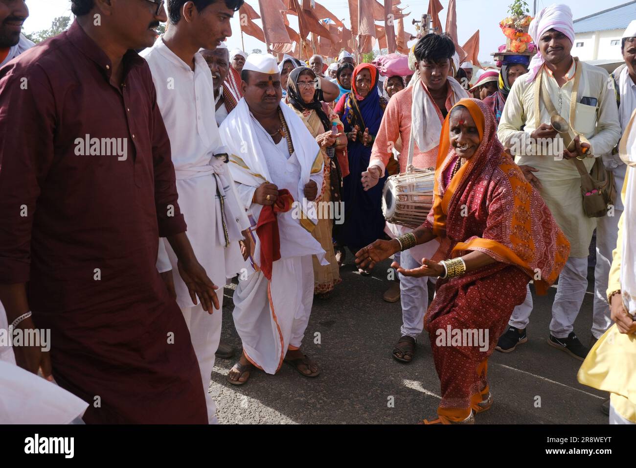 Pune, India 14 July 2023, cheerful Pilgrims at Palkhi, During Pandharpur wari procession Pilgrims marching toward Vitthala temple with singing. Stock Photo