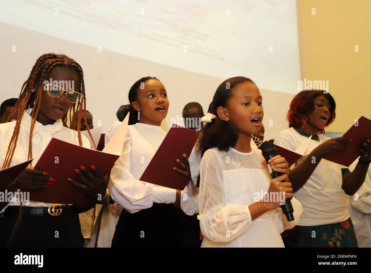 Luanda, Angola. 21st June, 2023. Angolan Chinese language learners sing songs during the 'Chinese Bridge' World Proficiency Competition in Luanda, Angola, June 21, 2023. A global Chinese language competition took place on Wednesday at Agostinho Neto University (UAN), one of Angola's most prestigious universities, in the capital of Luanda. Credit: Lyu Chengcheng/Xinhua/Alamy Live News Stock Photo
