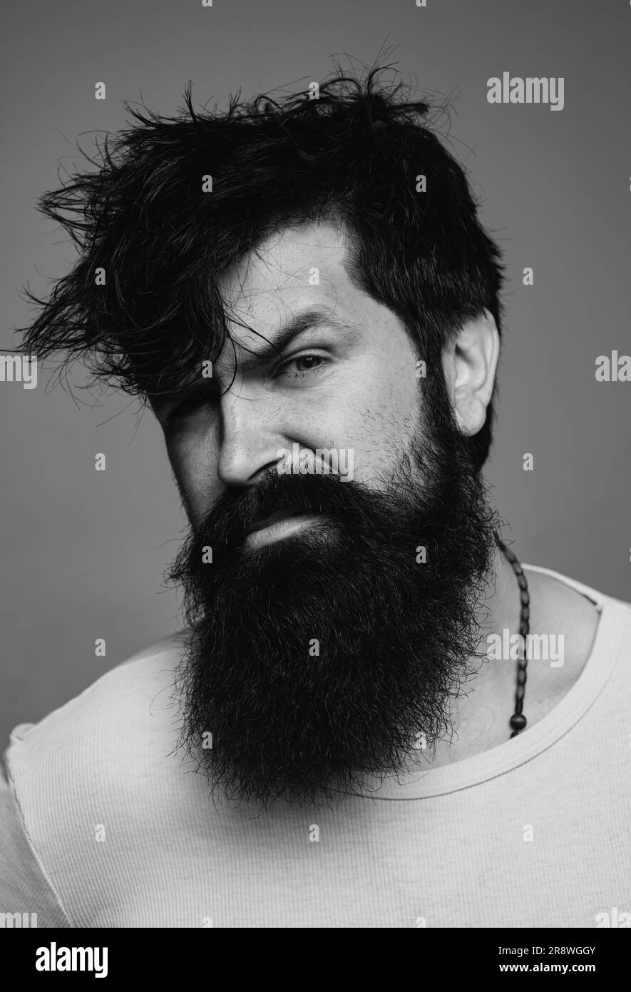 Man haircut, modern hair style. Close up portrait of male model with