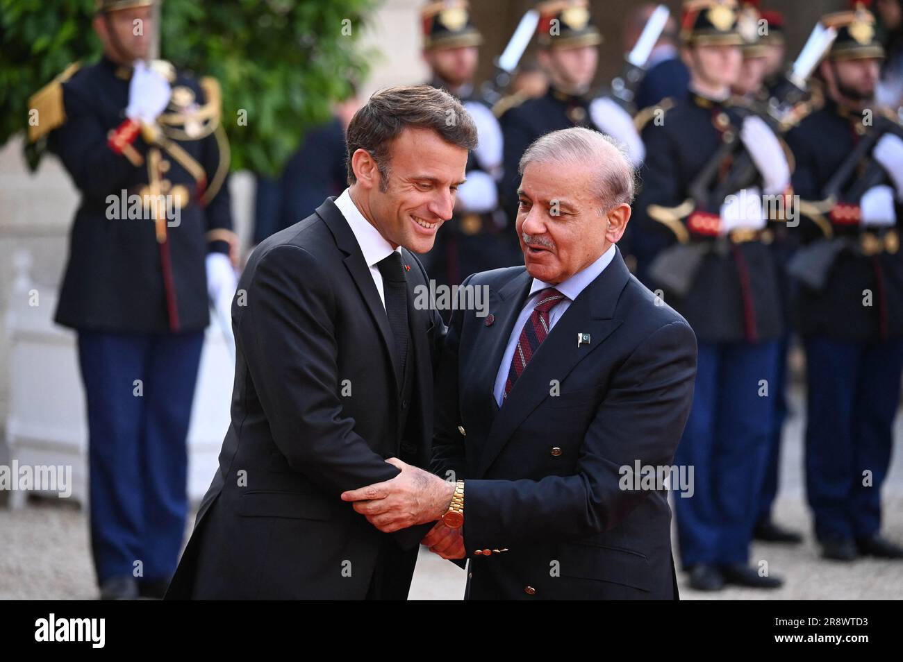 French President Emmanuel Macron greets Muhammad Shebbaz Sharif, Prime ...